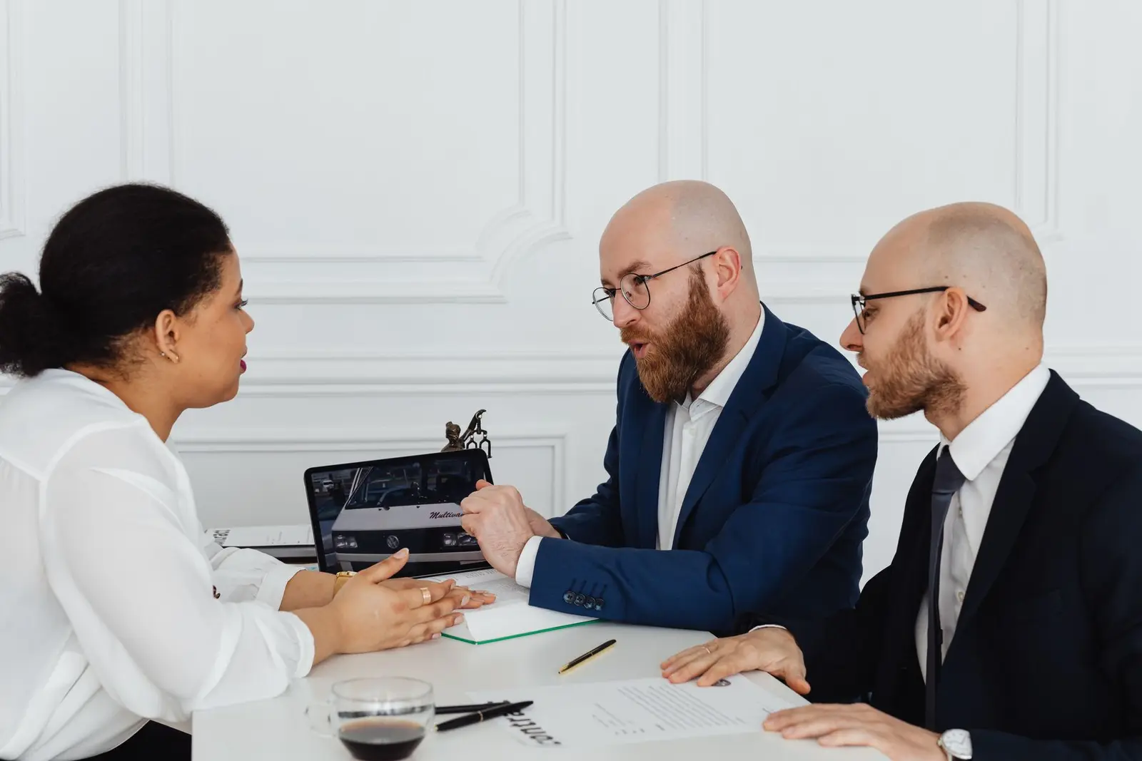 Technology consultants reviewing an infrastructure plan with a client